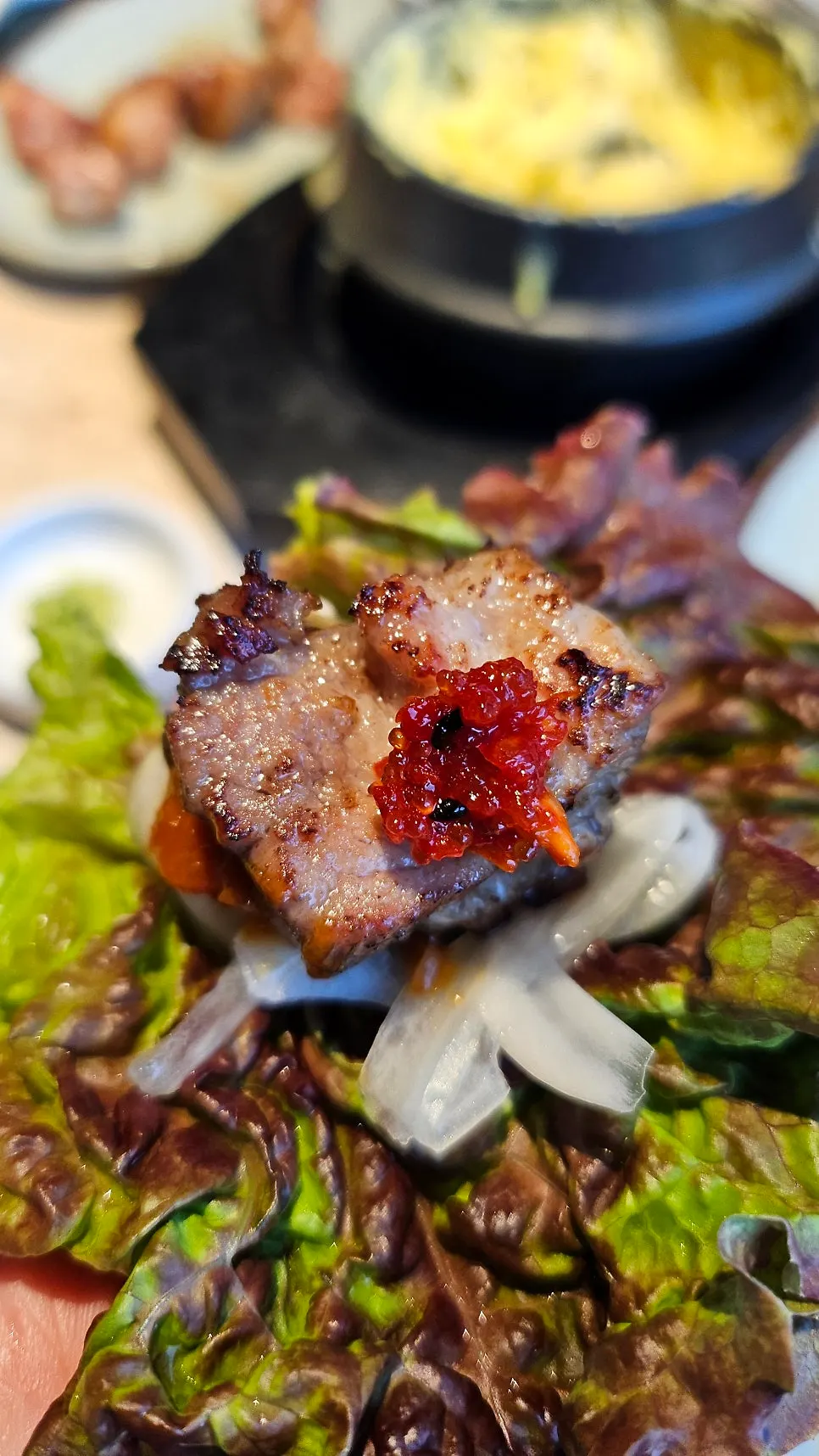 Close-up of staff grilling the meat