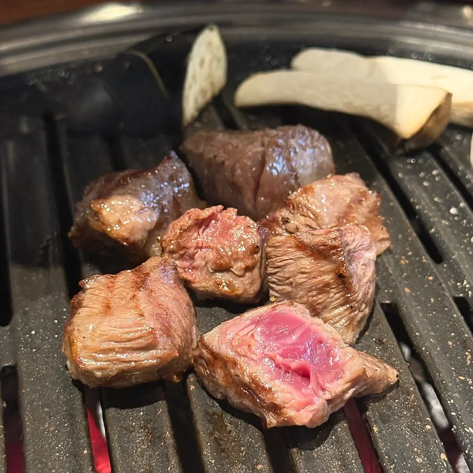 Korean beef sirloin grilling over charcoal