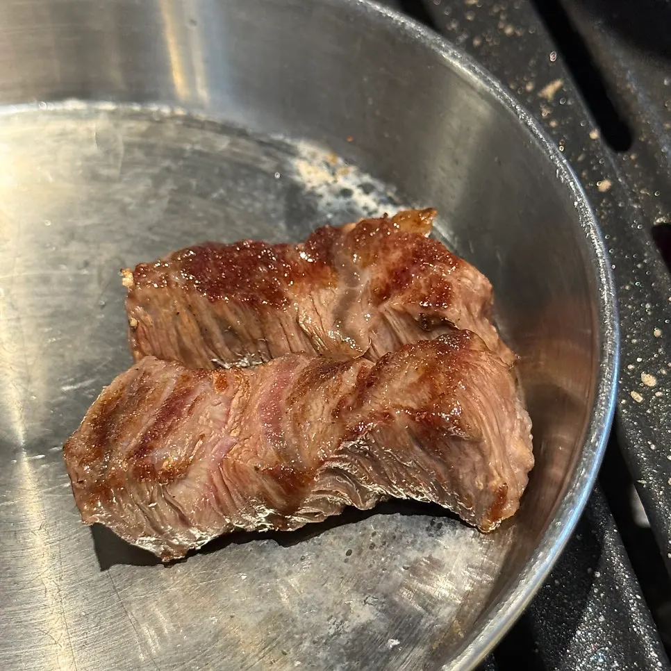 A golden-grilled piece of Korean beef sirloin