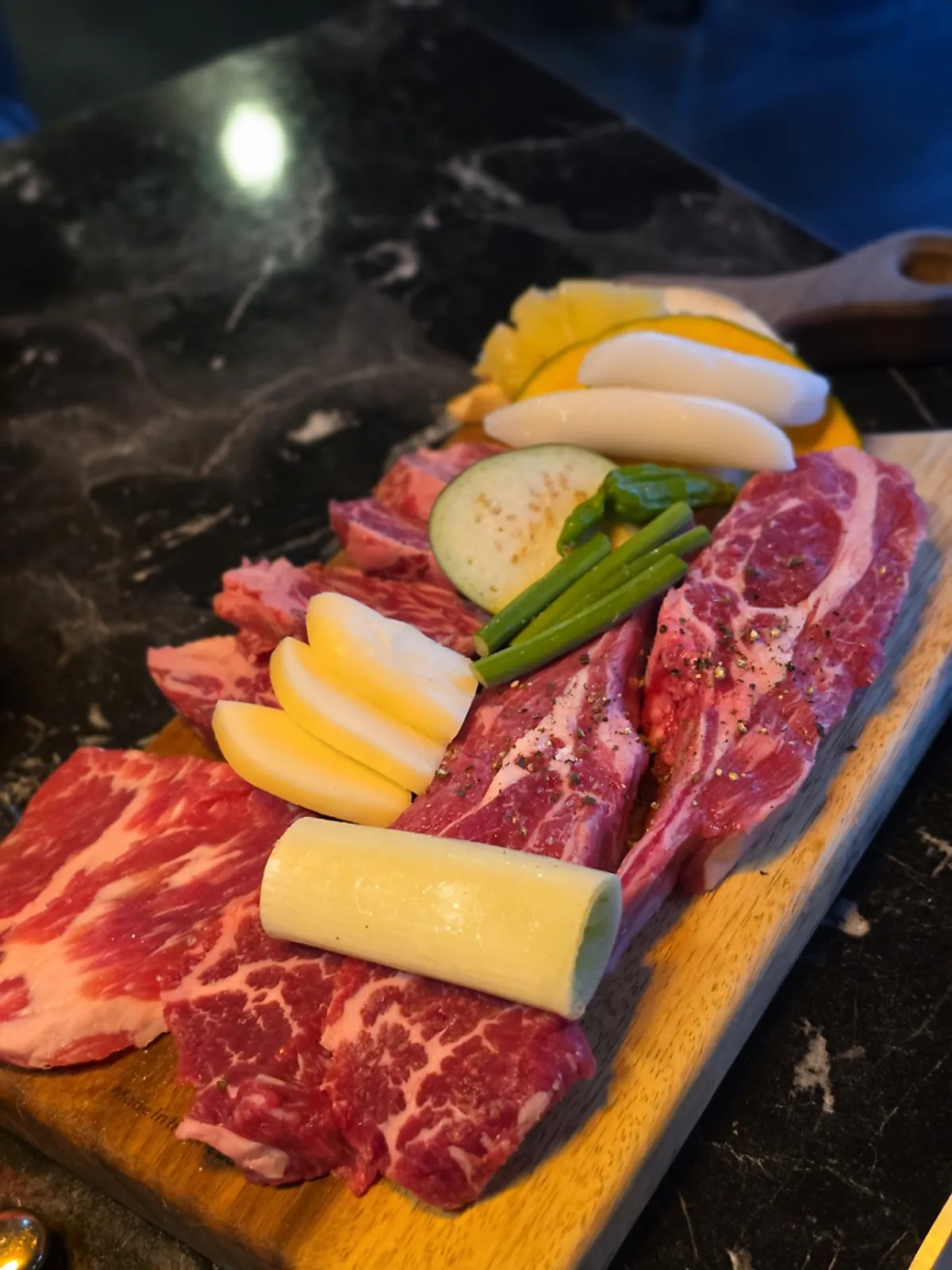 The full spread of beef and lamb rack eaten at Yukrab Jongno