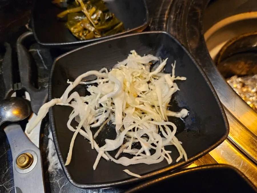 Bowls of cumin salt and soy sauce