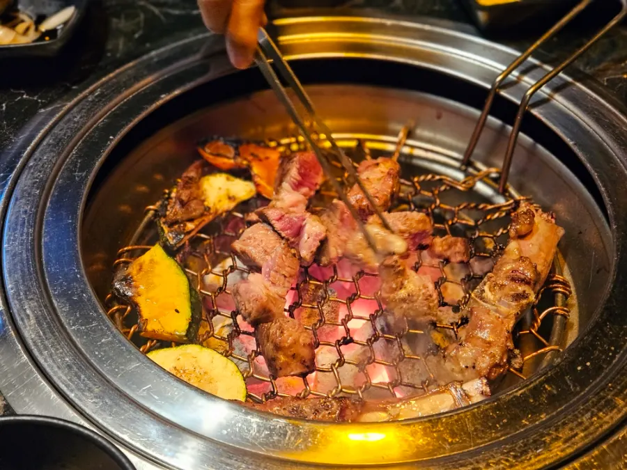 Grilled lamb ribs with bone attached
