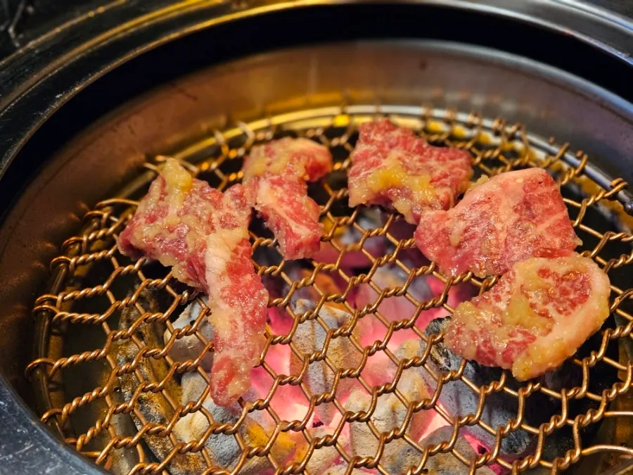 Yangnyeom galbi cooking on the grill