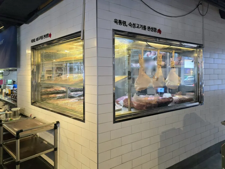 Low-temperature aging room for black pork near the entrance