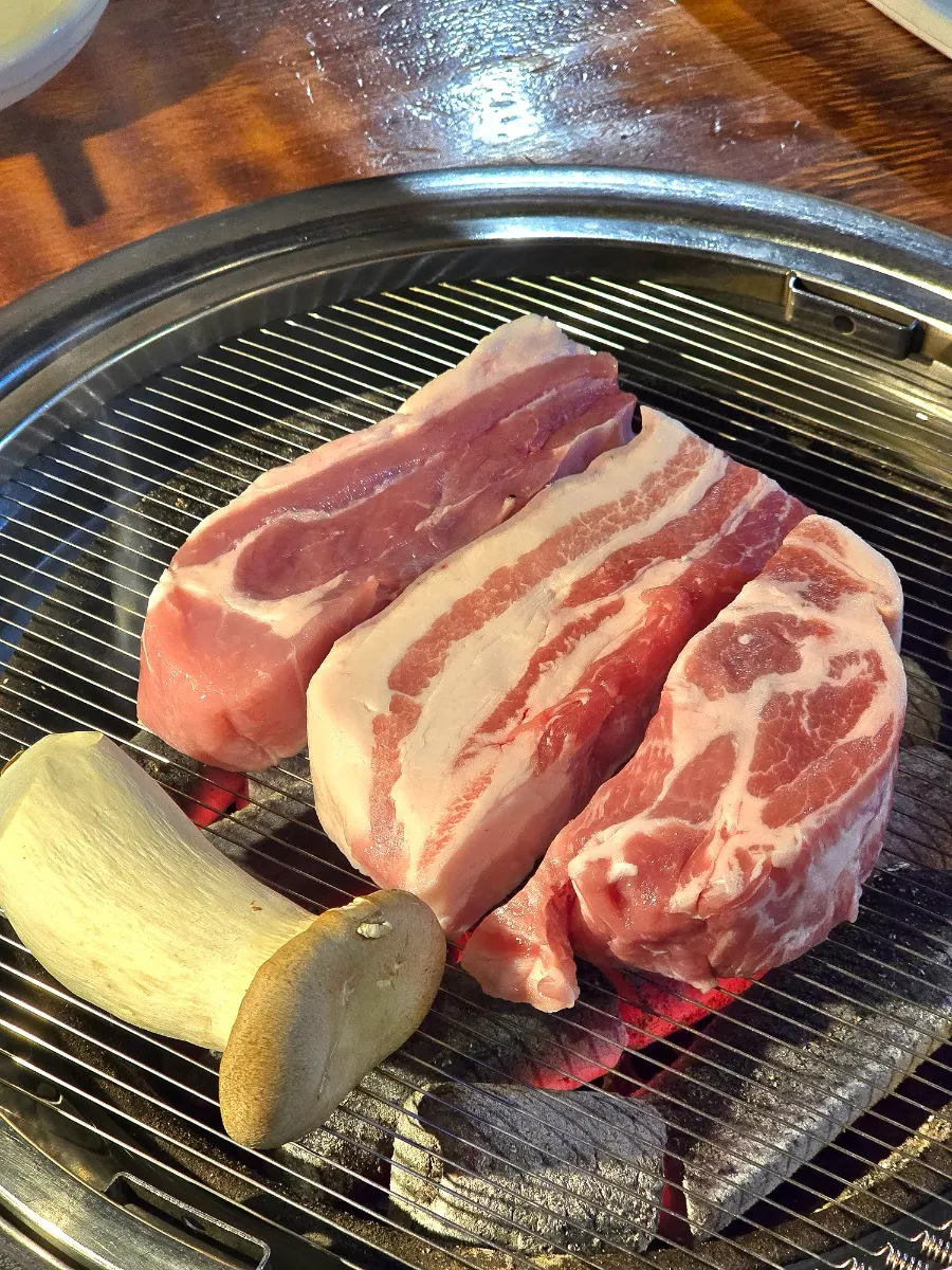 Plate with samgyeopsal, yukgyeopsal, and mokssal