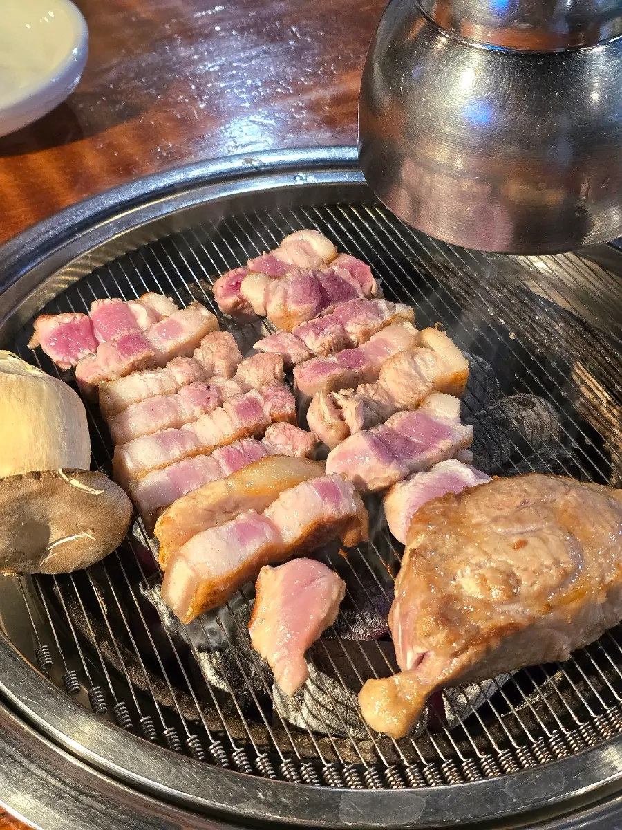 Cut meat with juices rising on the surface