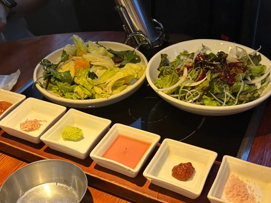 Dining hall seating at Yuk Tongryeong Gyodae Direct Store with a dignified atmosphere