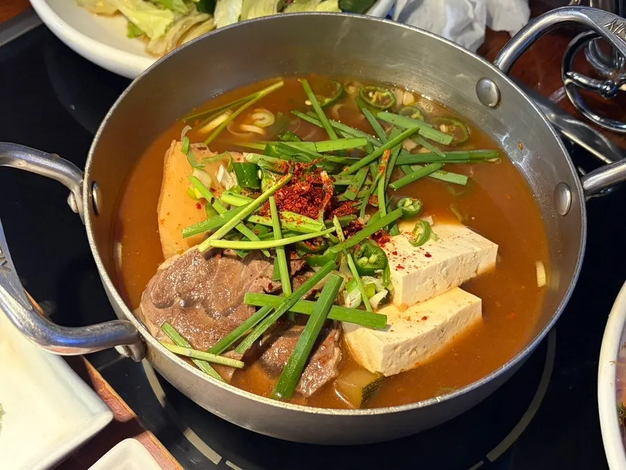 Raw ogyeopsal and yukgyeopsal from Yuk Tongryeong on a plate