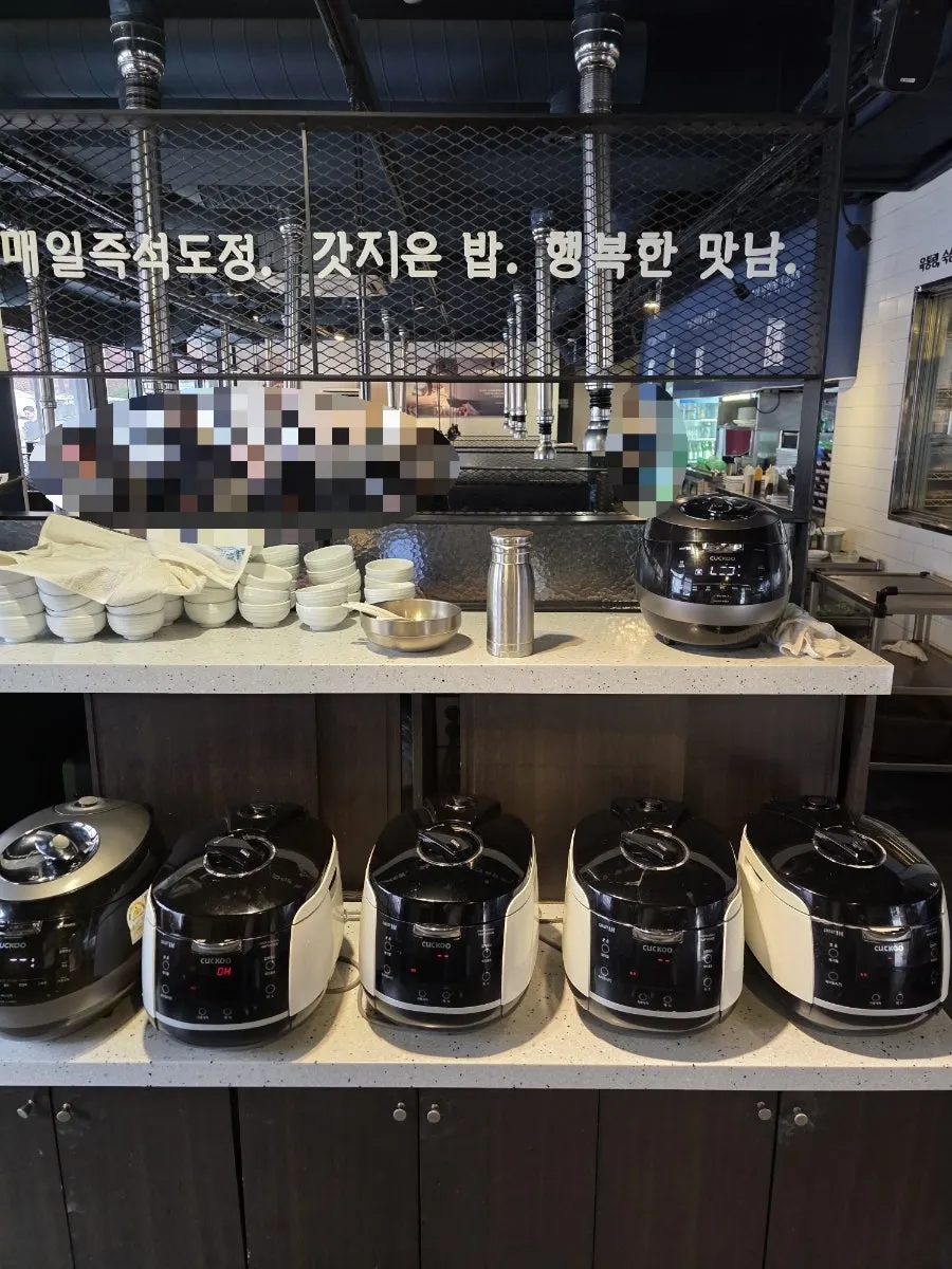 Freshly cooked rice set out at the front of the store