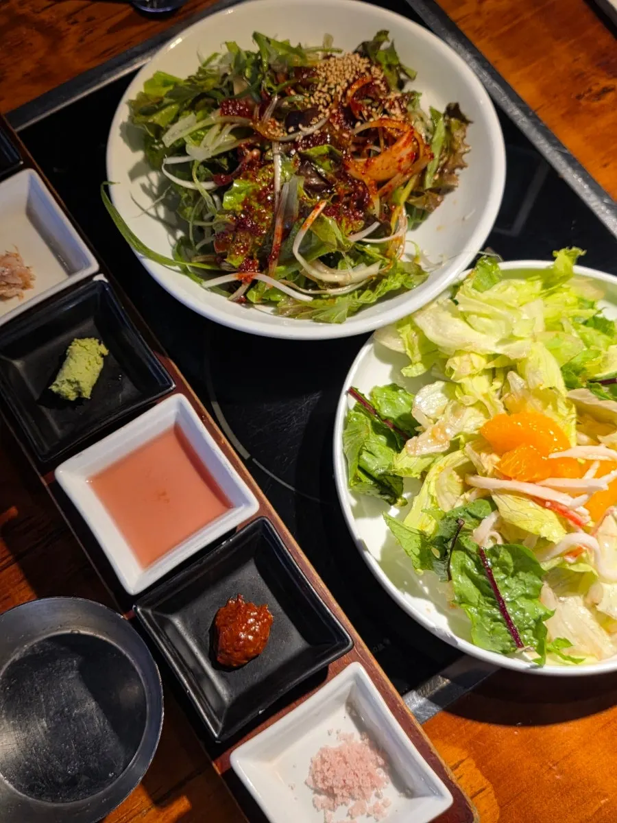 Basic side dishes including shredded green onion and salad