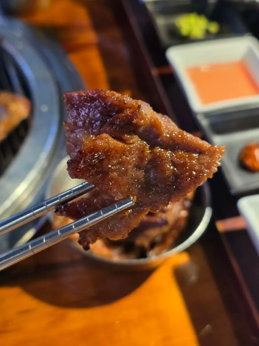 A fully grilled piece of handmade pork rib