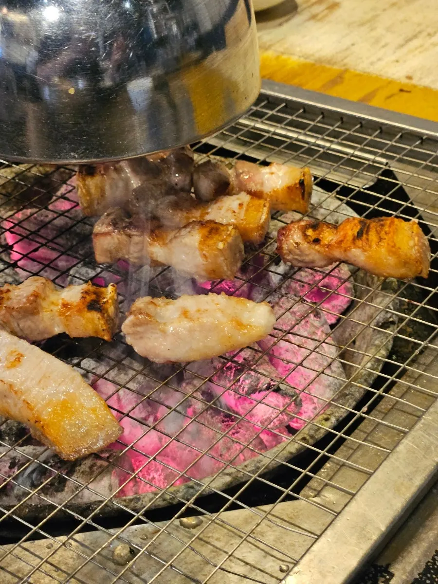 Mixing the bibim sauce into dongchimi naengmyeon