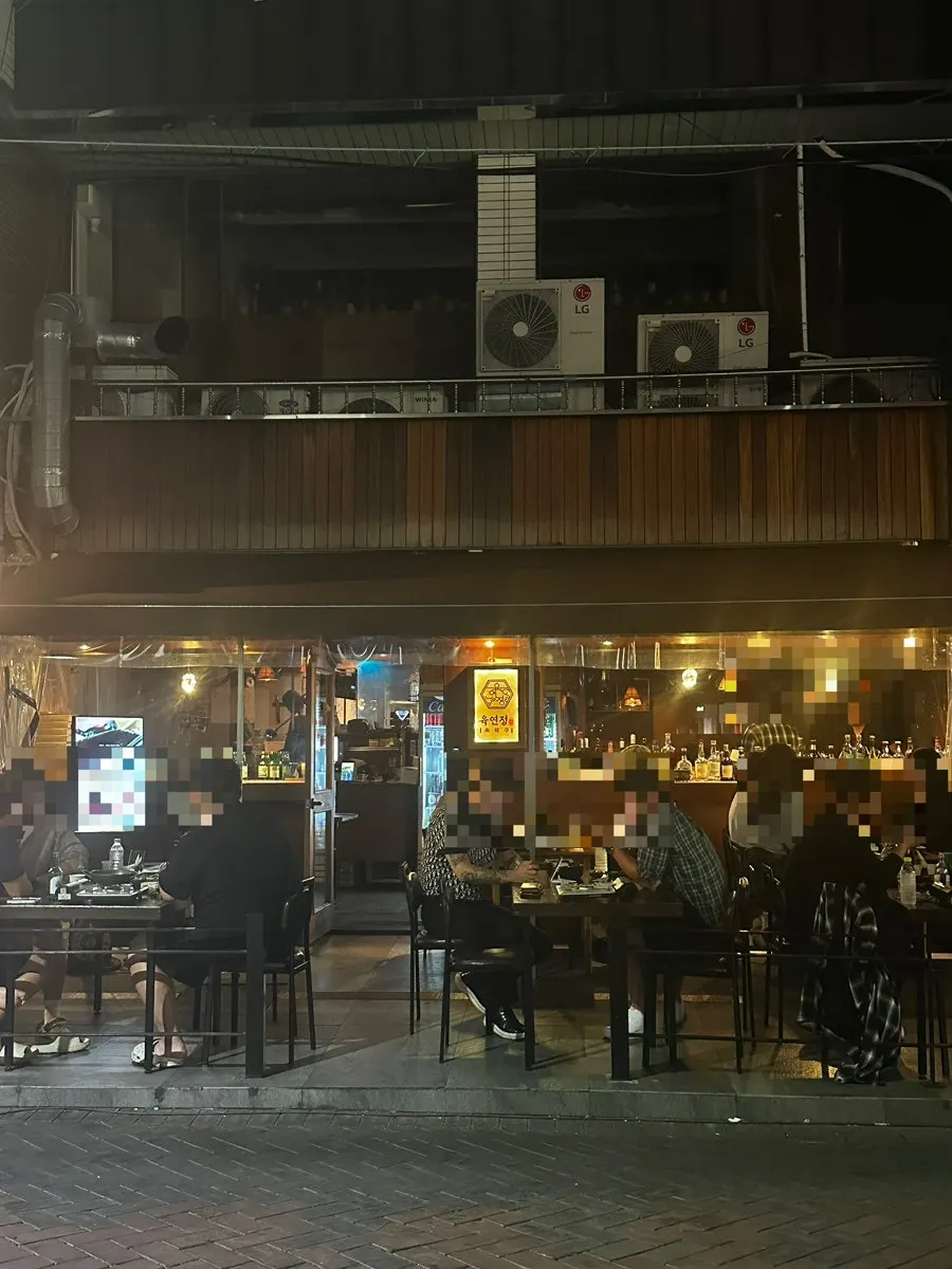 Interior view of Yukyeonjeong Gyodong with accent lighting on