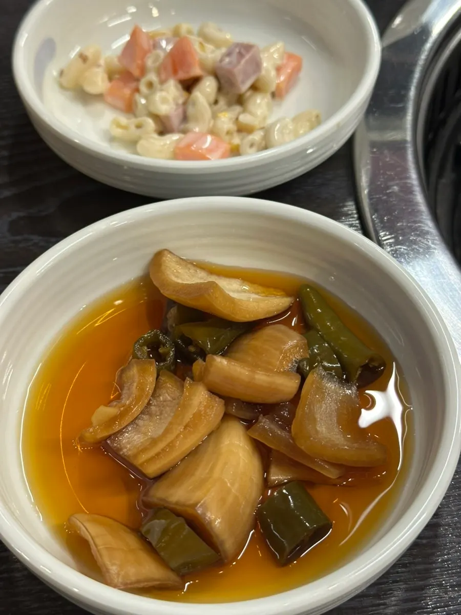A glass of soju-and-beer cocktail mixed at the table