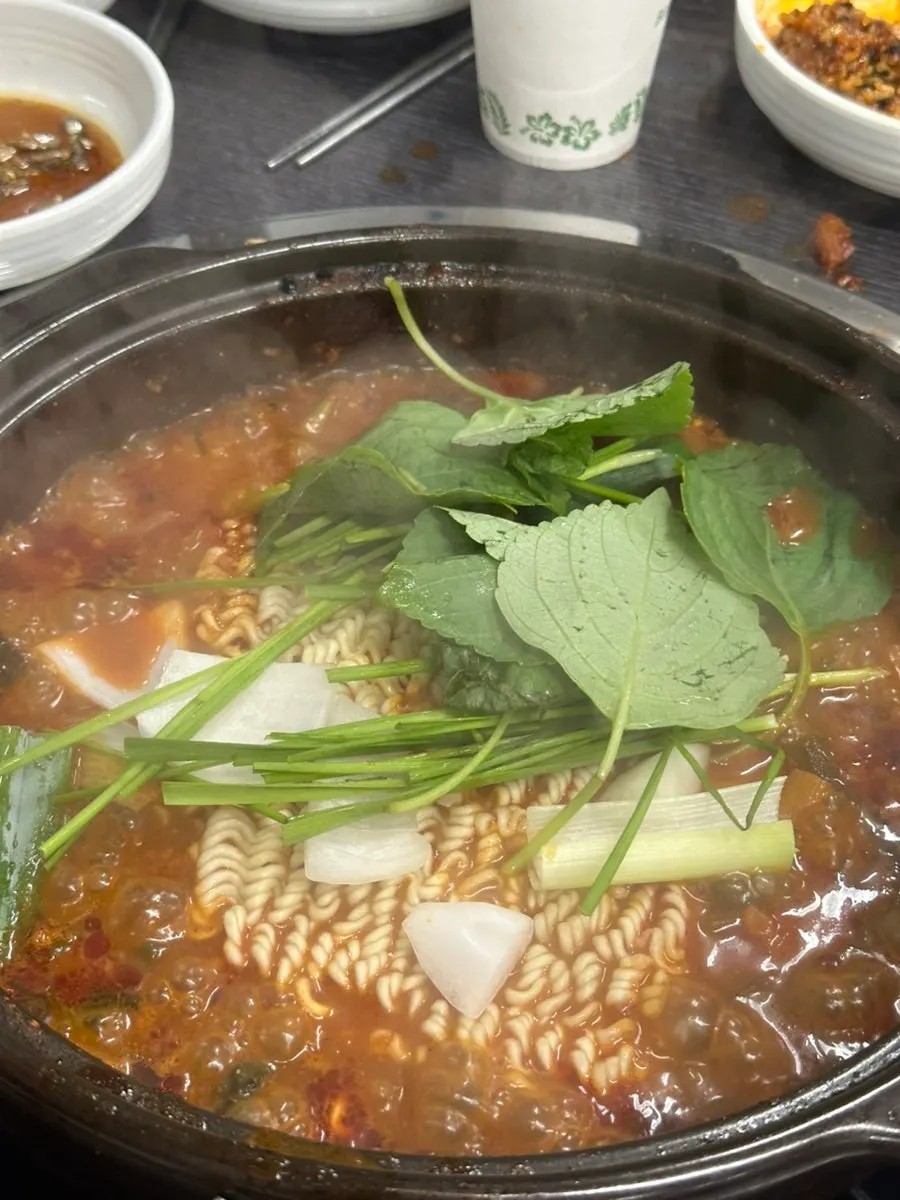 Ramen noodles cooked in the hot pot broth