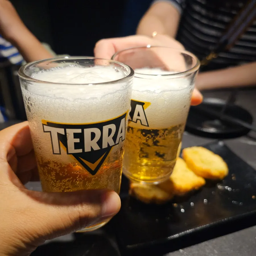 Beer glass at the window seat