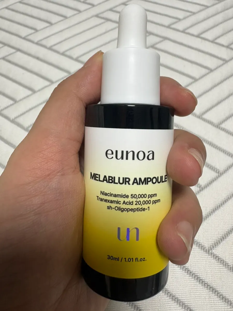 Applying dark spot ampoule after toner
