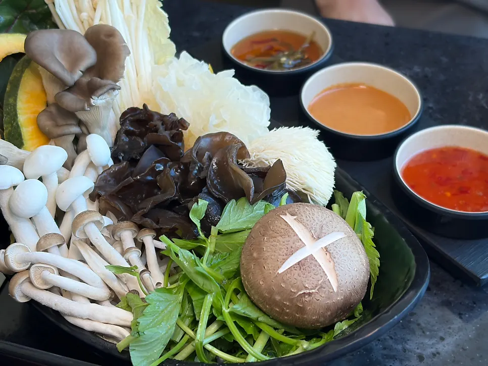 A plate of assorted mushrooms for shabu-shabu