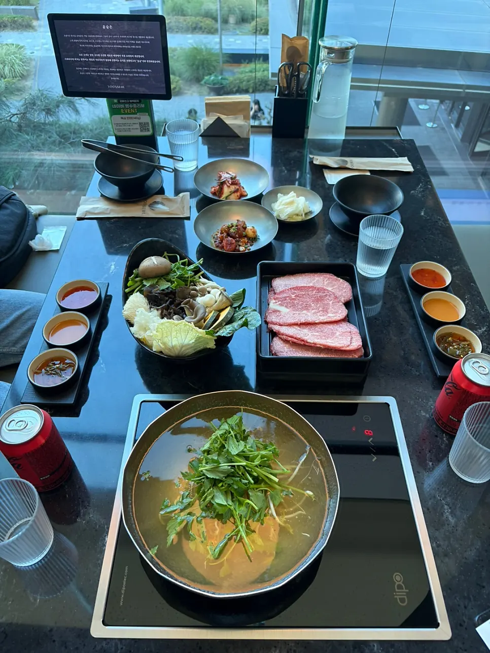 Seat at Yunseul with a view of the downtown skyline through the window
