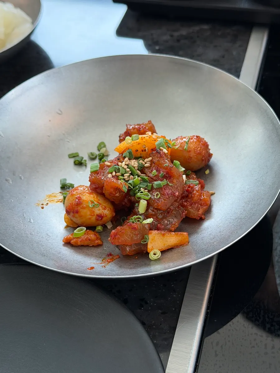A plate of seuji (beef tendon) served complimentary