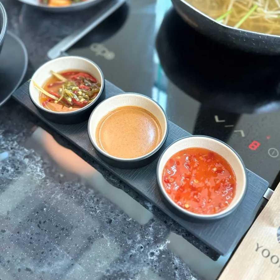 Shabu-shabu meat dipped in three kinds of sauce