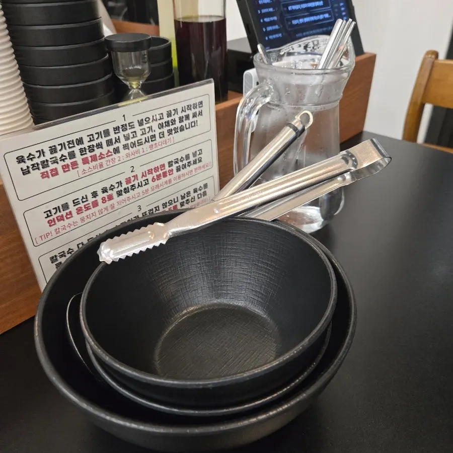Spoons and chopsticks sanitized in hot water before serving