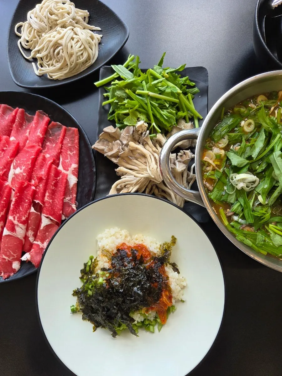 Pot of spicy shabu broth simmering