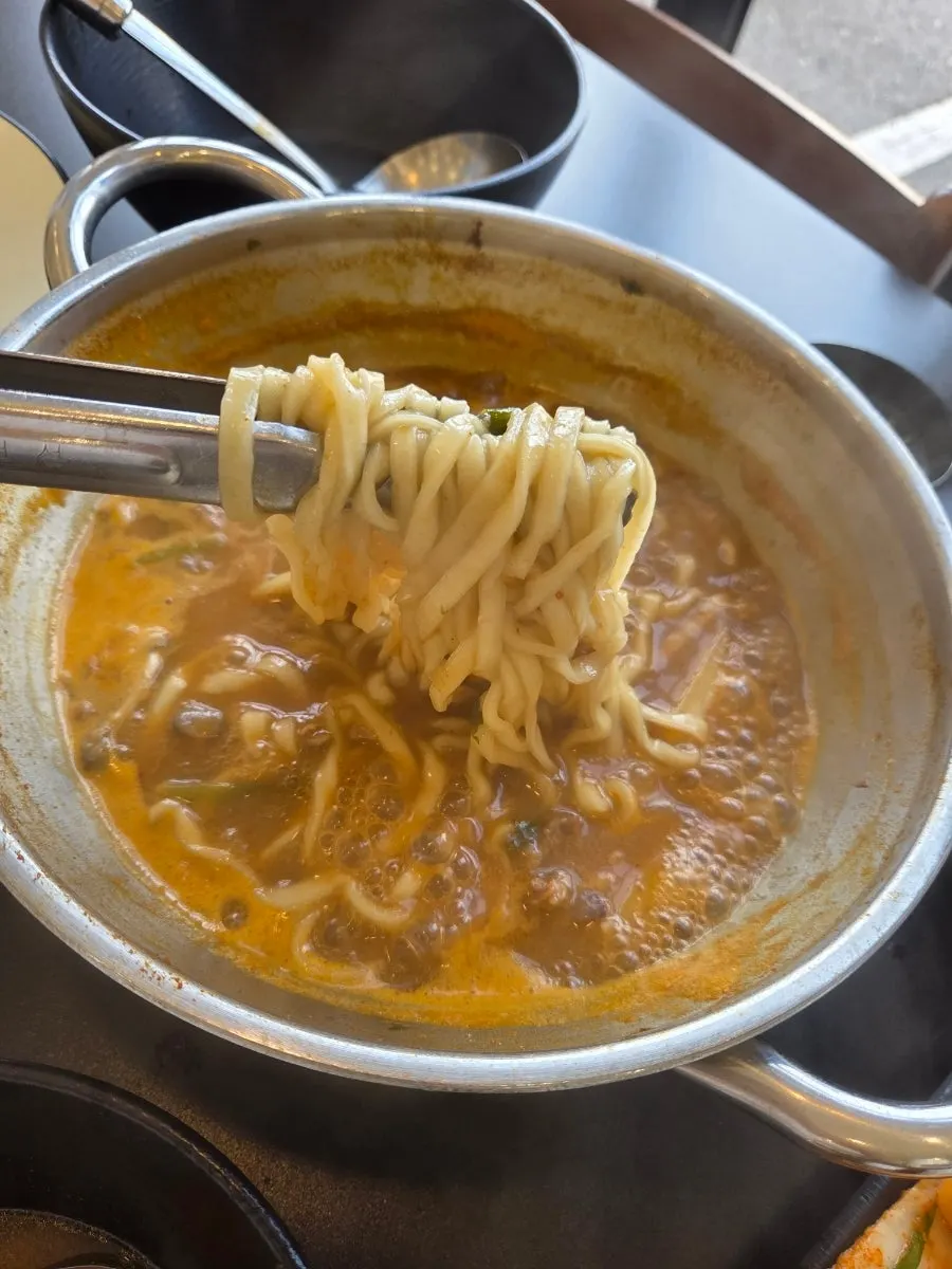 A bowl of finished spicy kalguksu