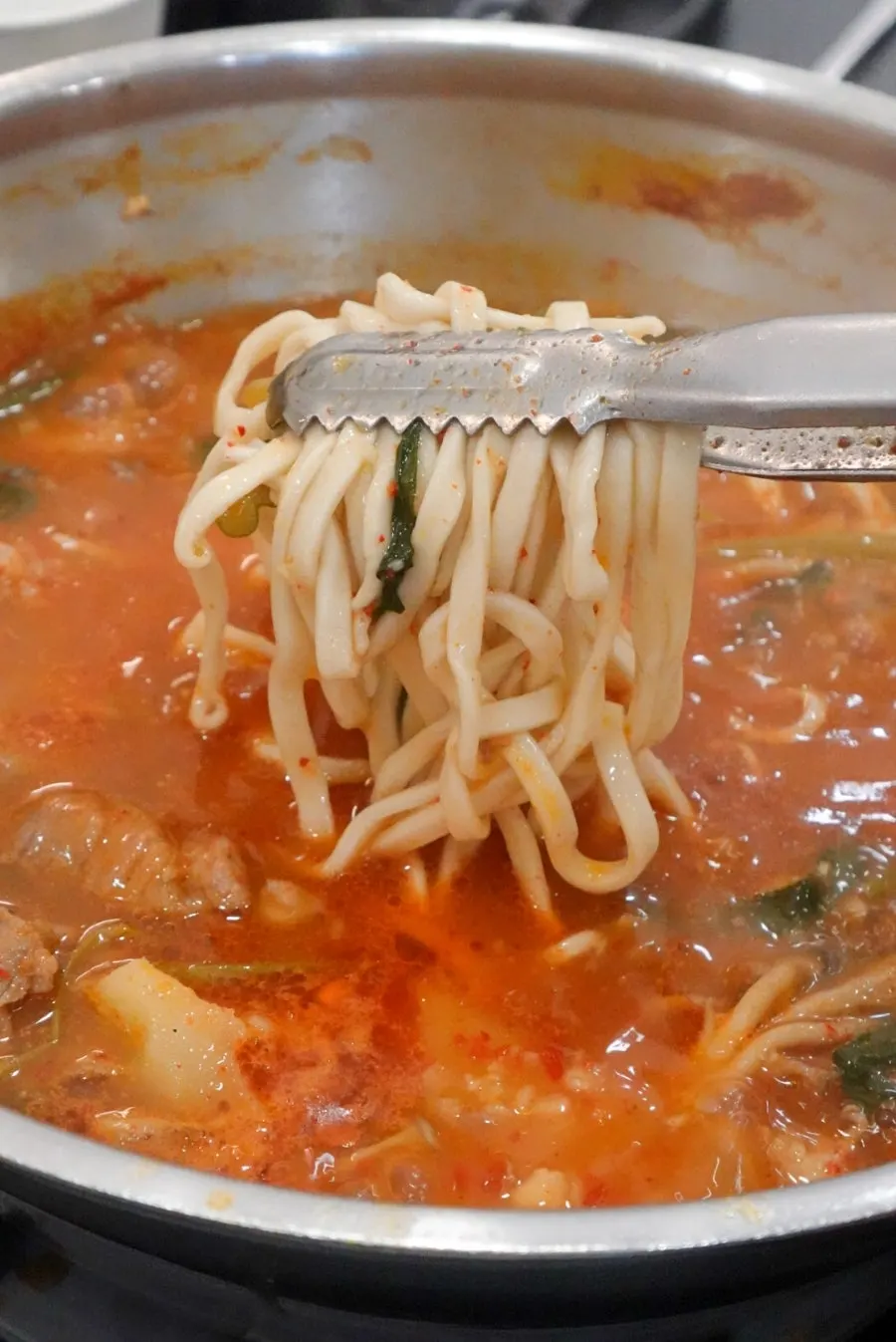 Chewy kalguksu noodles boiled in the broth
