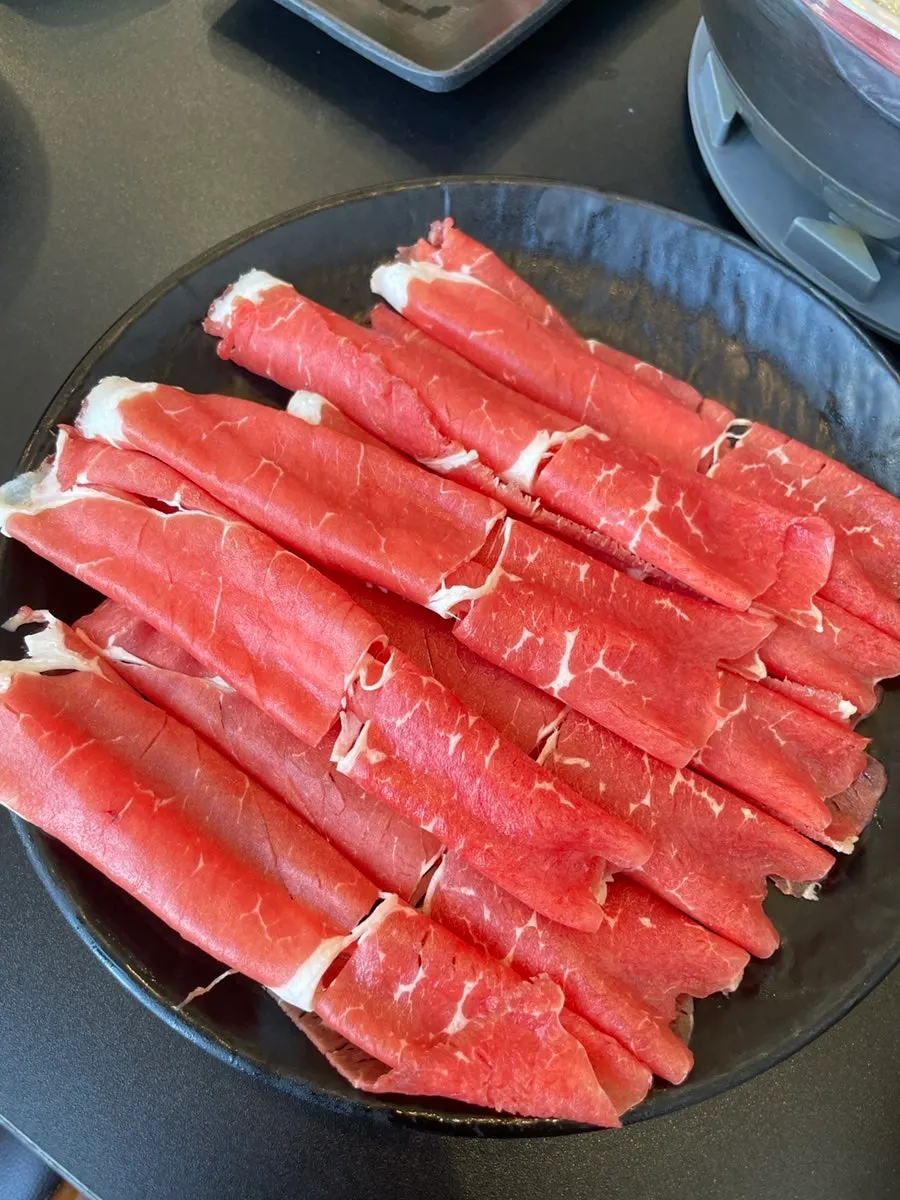 Two servings of shabu-kalguksu at ₩11,500 per person