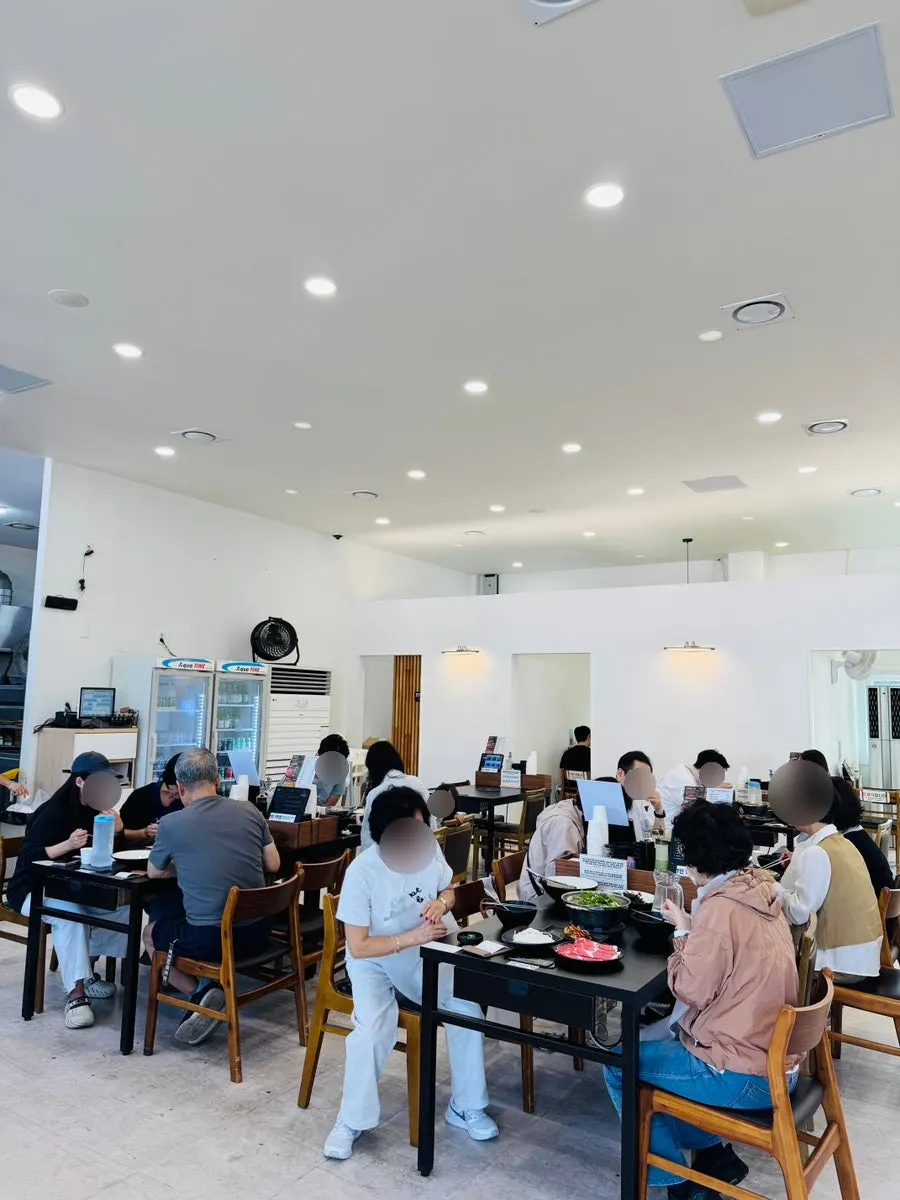 Interior of Yun Ujae Shabu Kalguksu full of customers