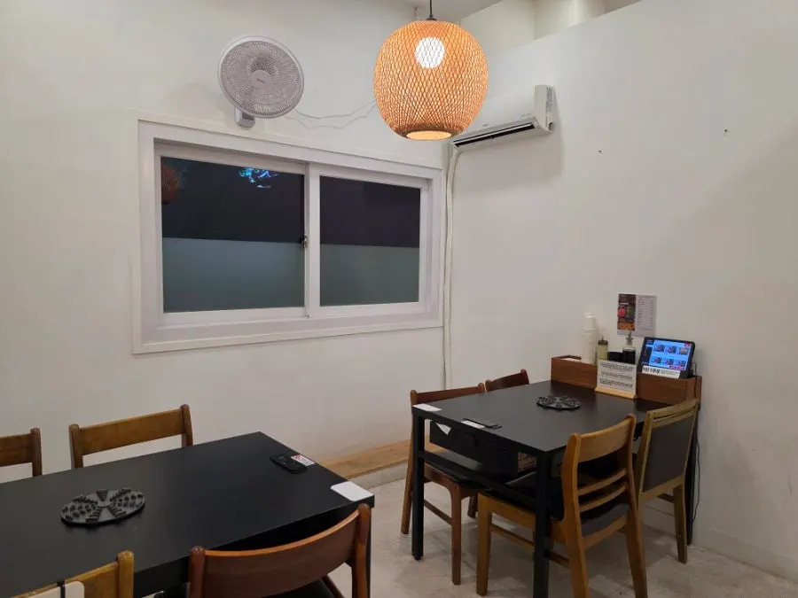 Bustling hall interior of Yun Ujae Shabu Kalguksu, full of customers