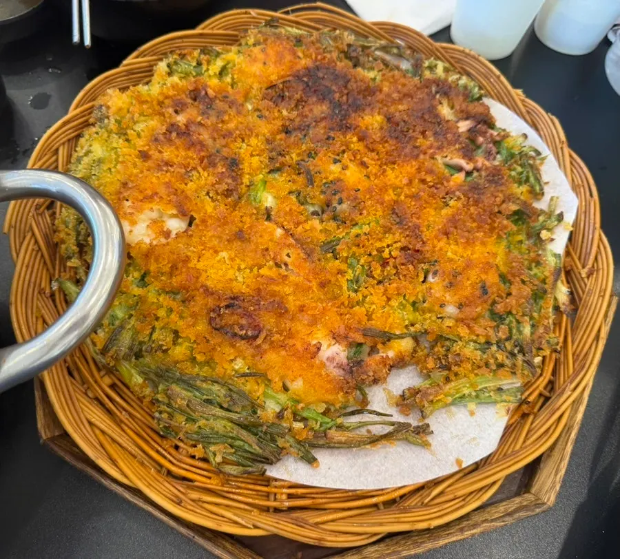 Kalguksu noodles added to boiling broth