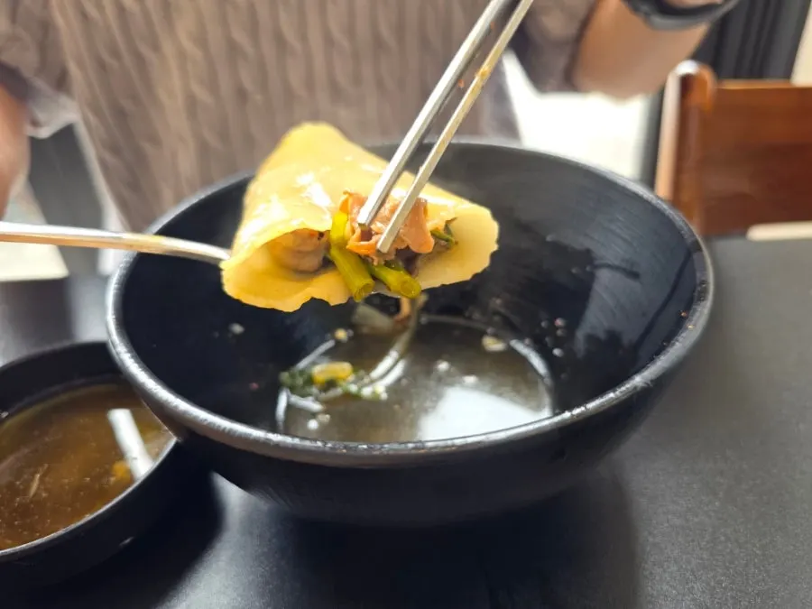 Kalguksu noodles boiling in the broth