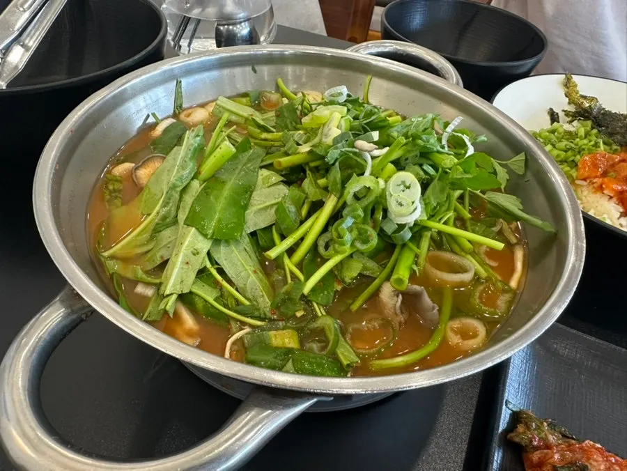 Table setup for two servings of red broth shabu-shabu
