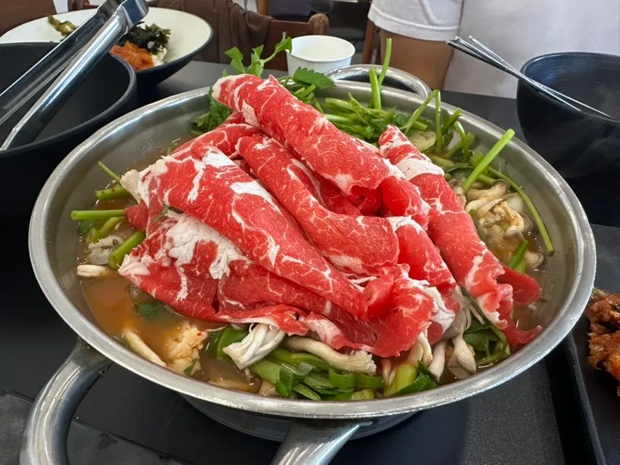 Pot loaded with a huge amount of meat