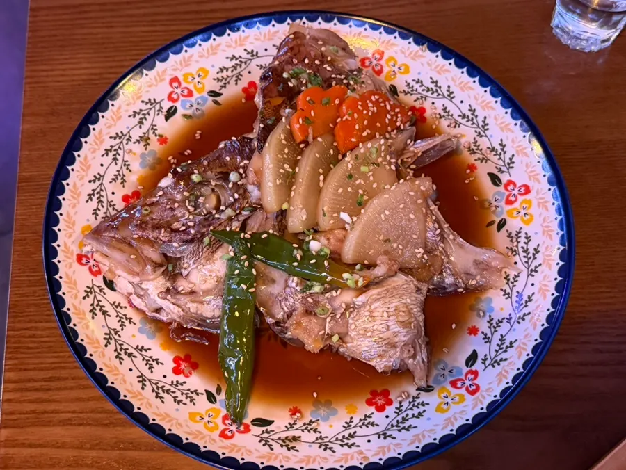 A plate of Yurak's mackerel hand rolls served with seaweed