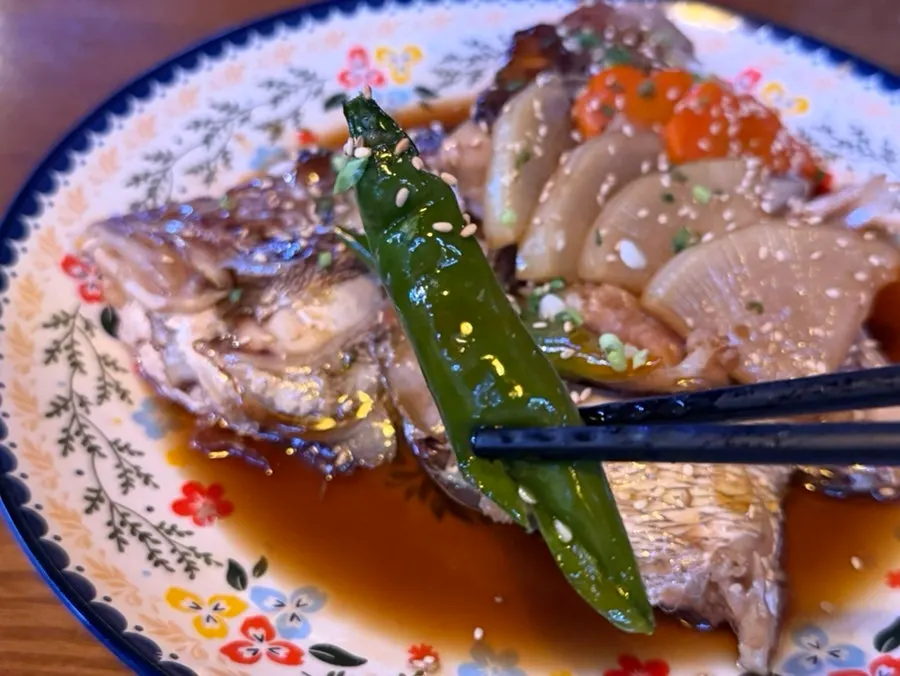 Tender sea bream meat picked from the braised head