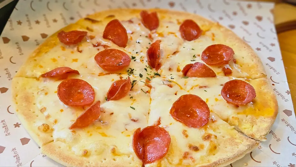 Meal with pizza and rice balls