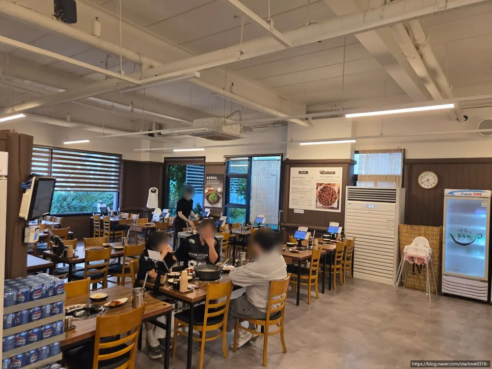View of the dining hall with spacious tables