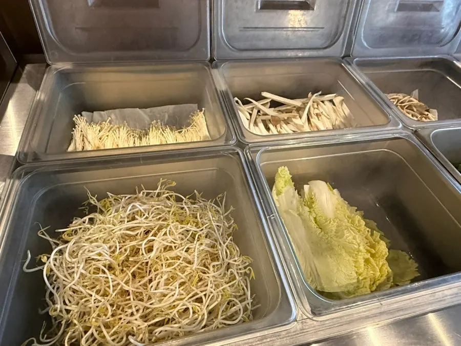 All-you-can-eat vegetables displayed at the self-serve bar