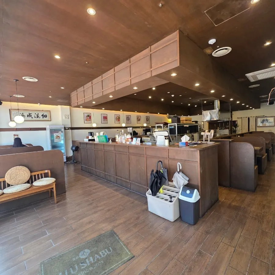 Yuyu Shabu hall seating with wood-tone interior