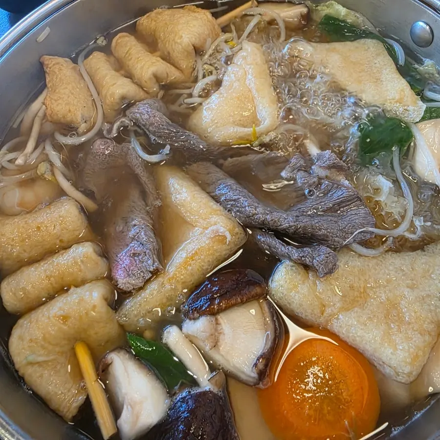 Vegetables and meat added to the boiling broth