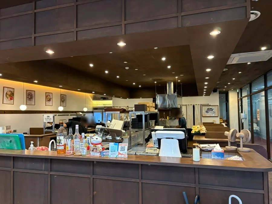 Interior of Yuyu Shabu with the open kitchen in the center