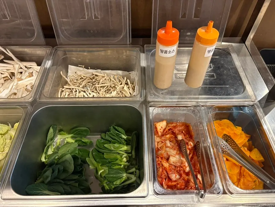 Fresh vegetables laid out at the self-bar