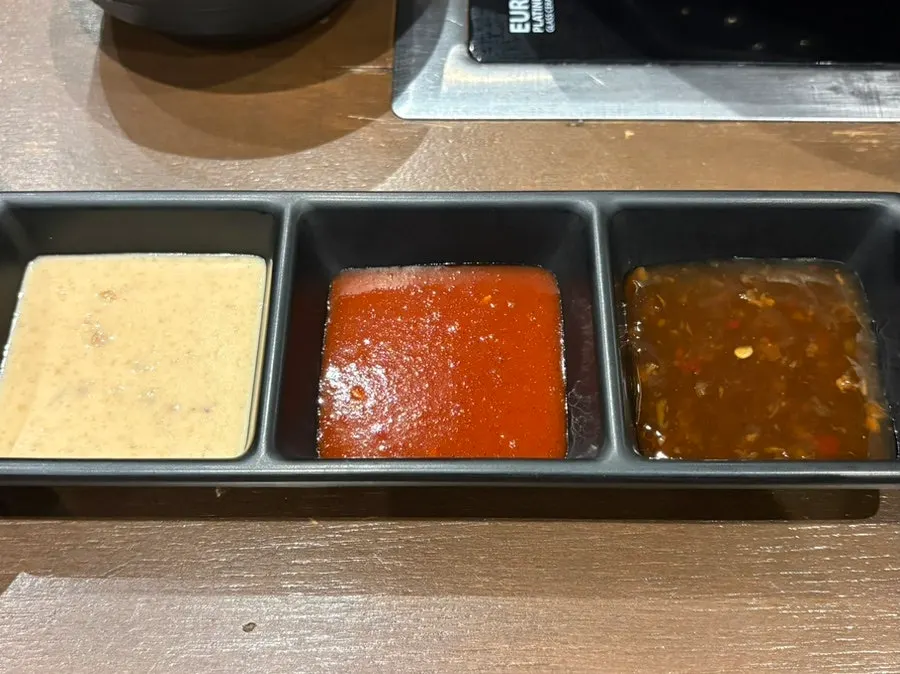 Three prepared sauces along with the tarae sauce