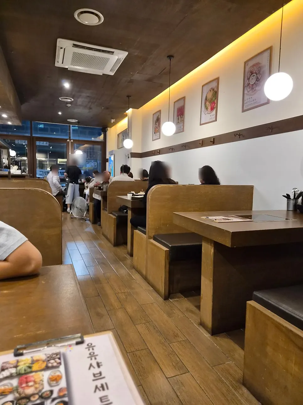 Wood-toned interior of Yuyu Shabu