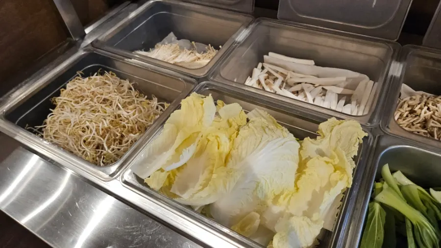 Vegetables and mushrooms prepared at the self-service corner