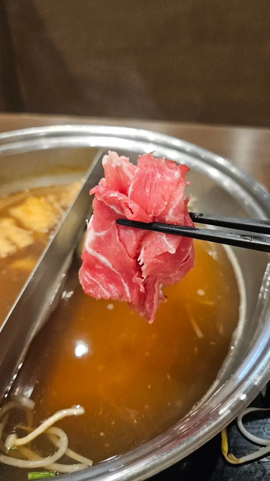 Finishing the meal with noodles in the leftover broth