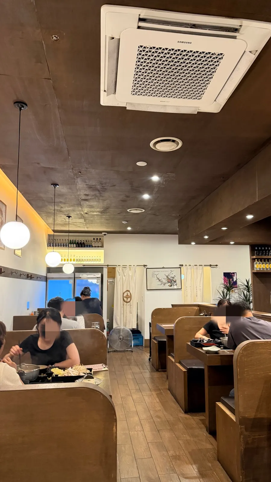 Cozy interior seating at Yuyu Shabu